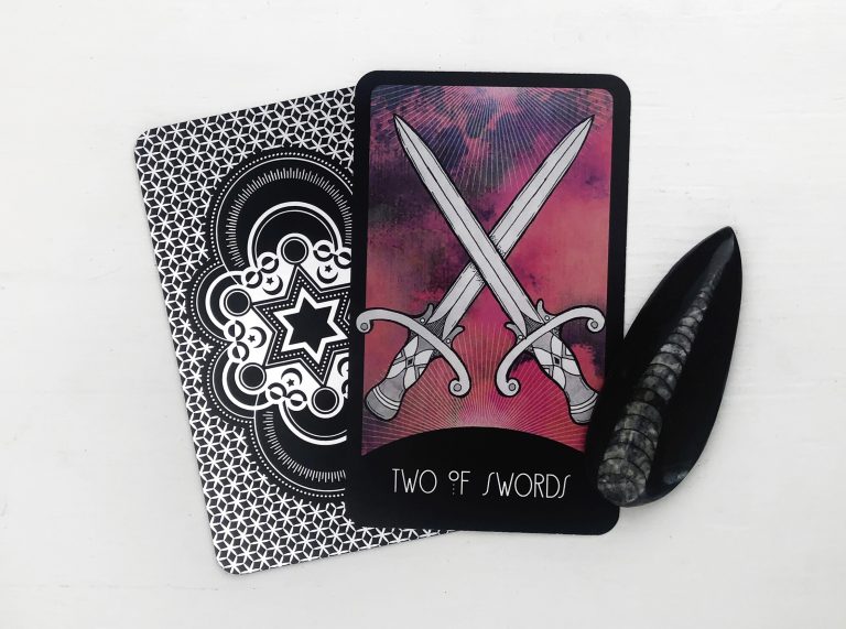 2 of swords tarot card meaning reversed