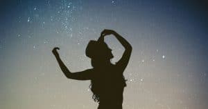 silhouette of a female pisces under love stars